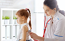 Little girl child being examined 56311